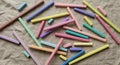 Rectangular, pastel-colored chalks of varying lengths are scattered Royalty Free Stock Photo