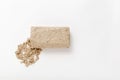 A rectangular piece sunflower halva