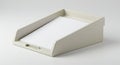 Rectangular plastic paper tray with slanted sides, designed for desktop organization. Royalty Free Stock Photo