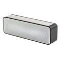 Rectangular portable Bluetooth speaker with silver grille and black casing audio sound Royalty Free Stock Photo