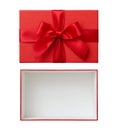 Rectangular red box with lid and red bow, isolated flat lay