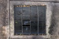 Rectangular sewer with a rust and holes Royalty Free Stock Photo