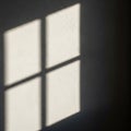 Rectangular shadows cast on a textured white wall forming a grid Royalty Free Stock Photo