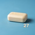 Rectangular shape with rounded edges. Below the soap the number 27 is Royalty Free Stock Photo