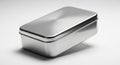Brushed metallic silver rectangular tin box with a seamless lid, isolated on a clean white background with subtle Royalty Free Stock Photo