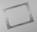 Rectangular silver metallic frame on gray background, art deco style.