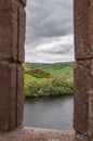 Rectangular slit in the wall of the ruins of Urquhart Castle, Loch Ness