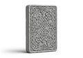 Rectangular stone tile with intricate Celtic knotwork engraving. The Royalty Free Stock Photo