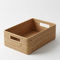 Rectangular Woven Rattan Storage Basket with Handles on a White Background Royalty Free Stock Photo