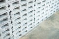 Rectangular thick concrete blocks are characterized by small pores scattered throughout the cube Royalty Free Stock Photo