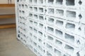 Rectangular thick concrete blocks are characterized by small pores scattered throughout the cube Royalty Free Stock Photo