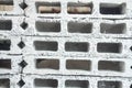 Rectangular thick concrete blocks are characterized by small pores scattered throughout the cube Royalty Free Stock Photo