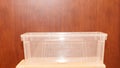 Rectangular transparent plastic container for food storage, ideal for packaging and preserving freshness Royalty Free Stock Photo