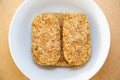 Rectangular wheat biscuits in a bowl
