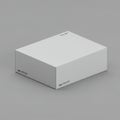 Rectangular white box on a gray surface, displaying a clean and minimalist design. Royalty Free Stock Photo