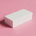 A rectangular white box with a slightly ajar lid on a pink background Royalty Free Stock Photo