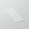 Rectangular white card or paper on a smooth, light gray background. Royalty Free Stock Photo