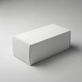 Rectangular white cardboard box with smooth surfaces and sharp edges placed on a Royalty Free Stock Photo