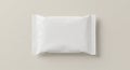 Rectangular, white, pillow-shaped packaging with crimped edges, commonly used for Royalty Free Stock Photo