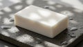 Matte finish of the soap contrasts with the rougher texture of the Royalty Free Stock Photo