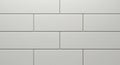 Rectangular white tiles arranged in a horizontal pattern, typical of a subway tile design Royalty Free Stock Photo