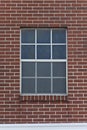 Rectangular windown on brick wall. Royalty Free Stock Photo