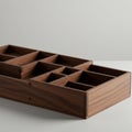 Rectangular wooden organizer with multiple compartments, featuring smooth finishes Royalty Free Stock Photo