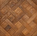 Rectangular wooden slats are perfectly matched to each other and neatly laid out in a diamond pattern