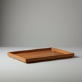 A rectangular wooden tray with clean lines and a smooth surface rests on a flat surface Royalty Free Stock Photo