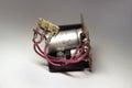 Rectifier filter circuit. part of vintage power supply, removed from sound amplifying device. red and purple wires with contact