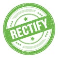 RECTIFY text on green round grungy stamp Royalty Free Stock Photo