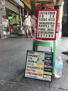 Recto, Manila, Philippines - A signboard touting fake documents and forgery services along the alleyway of a building