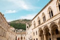 Rector`s Palace and medieval old town Pred Dvorom street in Dubrovnik, Croatia Royalty Free Stock Photo