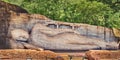 Recumbent Buddha statue at The Gal Vihara. Panorama Royalty Free Stock Photo