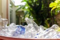 Recyclable garbage of glass plastic bottles in rubbish bin. Royalty Free Stock Photo