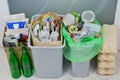 Recyclable garbage: glass, plastic, paper, cardboard, metal prepared for recycling. Waste to be recycled. Trash for recycle and Royalty Free Stock Photo