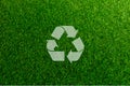 Recyclable Symbol a green grass background