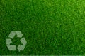 Recyclable Symbol a green grass background