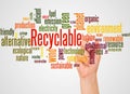 Recyclable word cloud and hand with marker concept Royalty Free Stock Photo