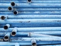 Recycle iron tube, rusty used metal background, blue steel bar Royalty Free Stock Photo