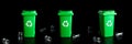 Recycle set garbage. Green dustbin for recycle plastic, paper and glass can trash isolated on black background. Bin