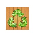 Recycle sign on wooden background Royalty Free Stock Photo