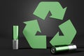 Recycle sign and green batteries