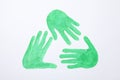 Recycle sign made of green hands on white background Royalty Free Stock Photo