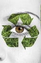 Recycle sign painted on face, eco concept Royalty Free Stock Photo