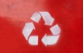 Recycle sign on red background and three white arrows. Eco way to protect the planet Royalty Free Stock Photo