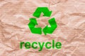 Recycle sign on wrapping paper