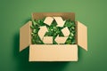 Recycle symbol on cardboard box against green background, eco friendly Royalty Free Stock Photo