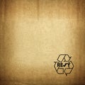 Recycle symbol on cardboard texture Royalty Free Stock Photo