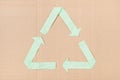 Recycle symbol made of paper cut on cardboard background Royalty Free Stock Photo